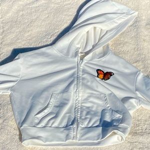 Size medium white cropped hoodie from ROMWE